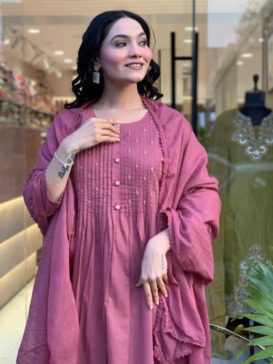 We presents a stunning Cotton anarkali Suit Set-a perfect blend of traditional patterns