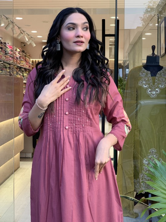 We presents a stunning Cotton anarkali Suit Set-a perfect blend of traditional patterns