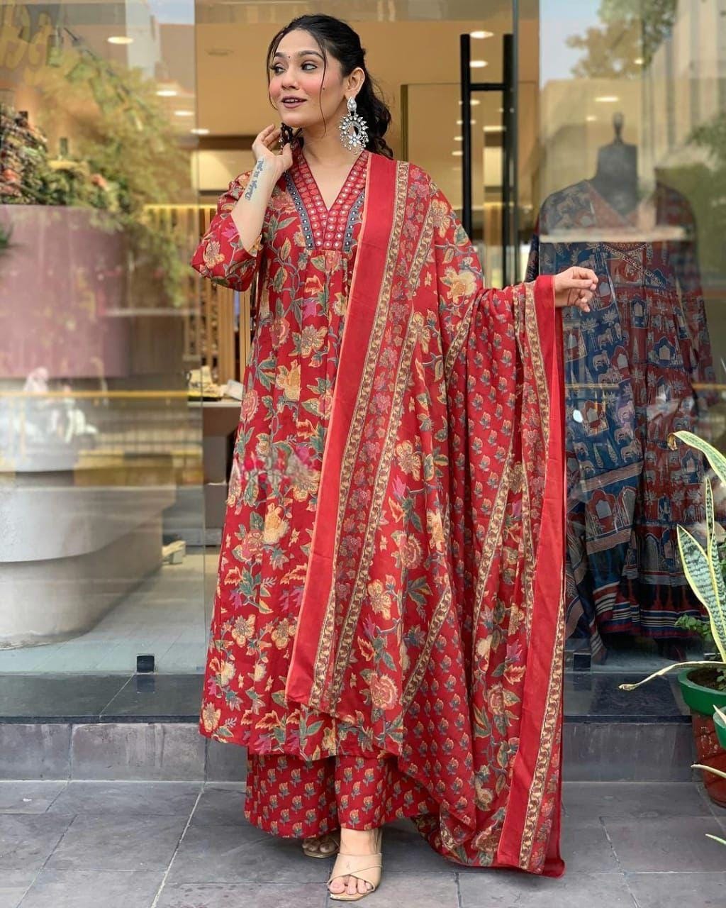 This A-line pant set is perfect for the summer season with its vibrant floral print and confident pocket one side. Plus, the included matching dupatta completes the look and adds an extra touch of style.(WARED206)