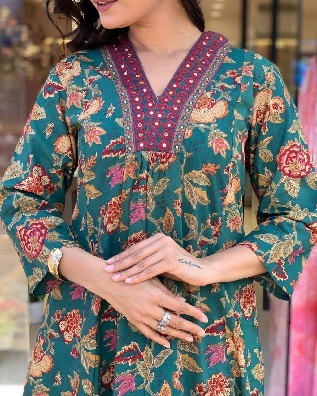 This A-line pant set is perfect for the summer season with its vibrant floral print and confident pocket one side. Plus, the included matching dupatta completes the look and adds an extra touch of style.(WARED205)