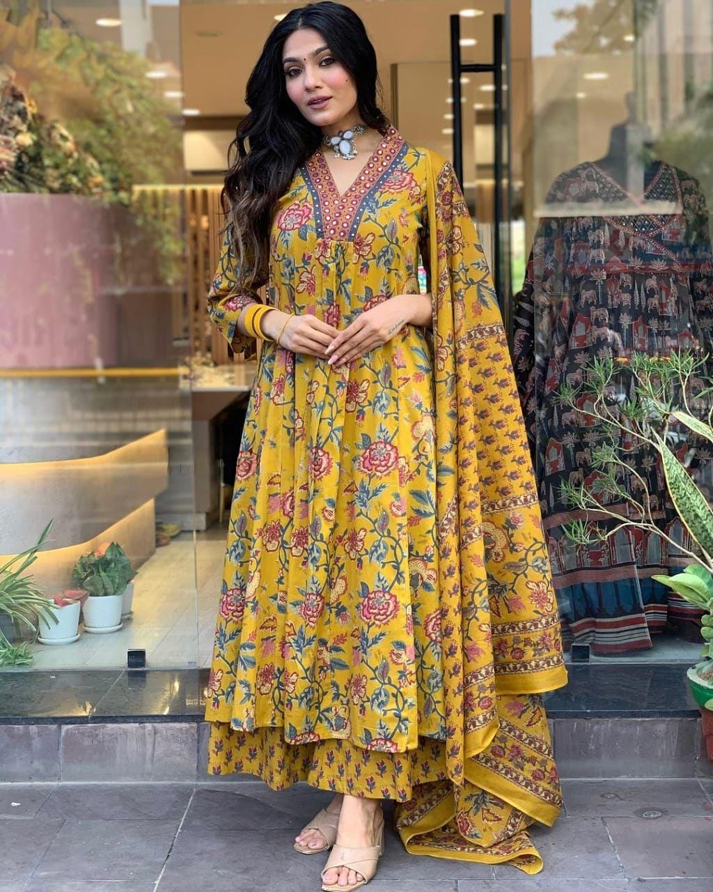 This A-line pant set is perfect for the summer season with its vibrant floral print and confident pocket one side. Plus, the included matching dupatta completes the look and adds an extra touch of style.(WARED207)