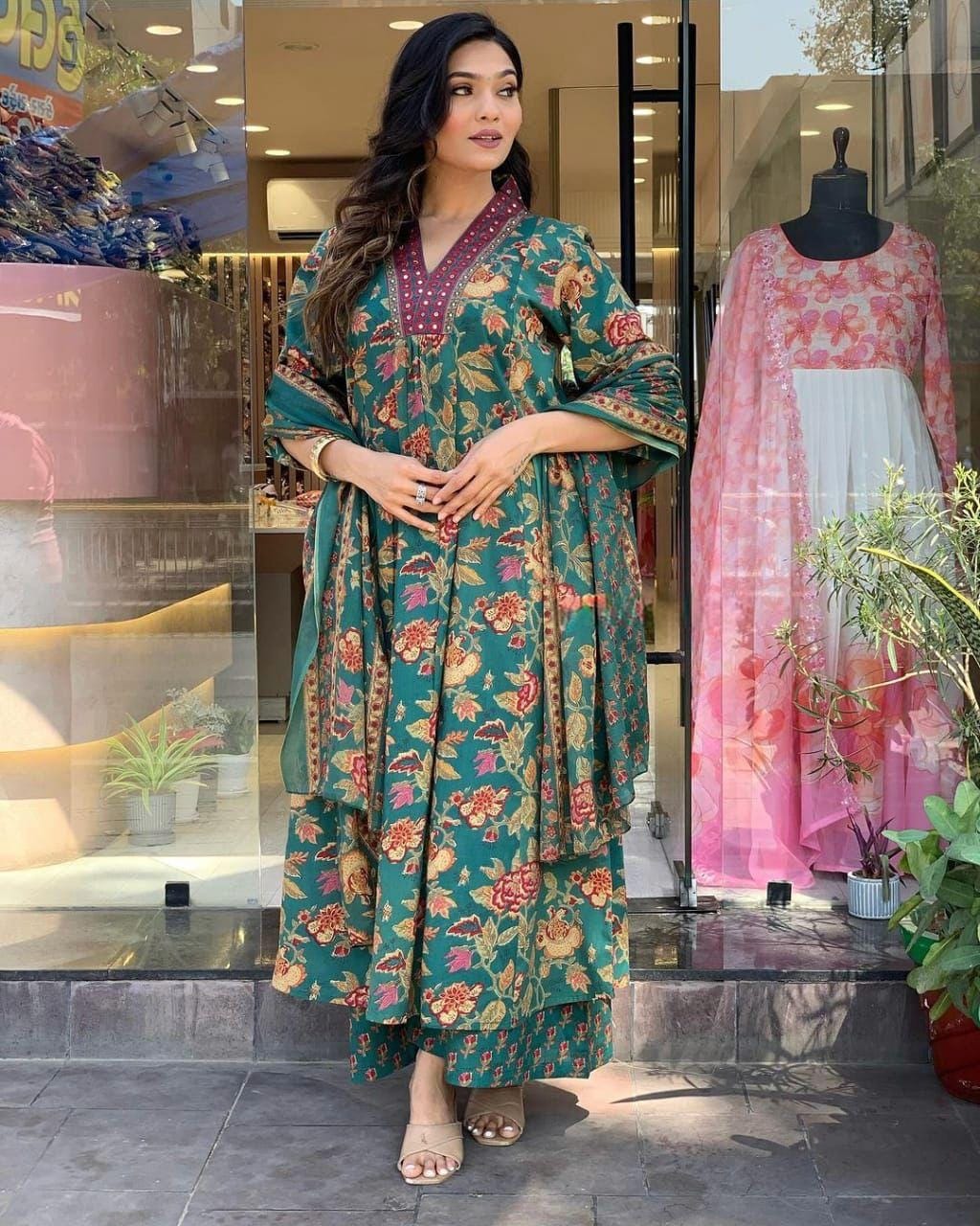 This A-line pant set is perfect for the summer season with its vibrant floral print and confident pocket one side. Plus, the included matching dupatta completes the look and adds an extra touch of style.(WARED205)