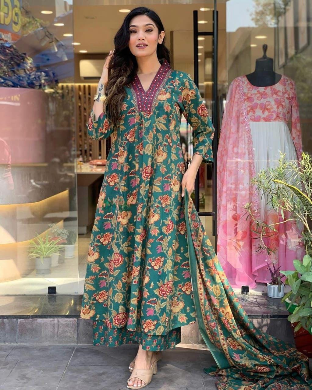 This A-line pant set is perfect for the summer season with its vibrant floral print and confident pocket one side. Plus, the included matching dupatta completes the look and adds an extra touch of style.(WARED205)