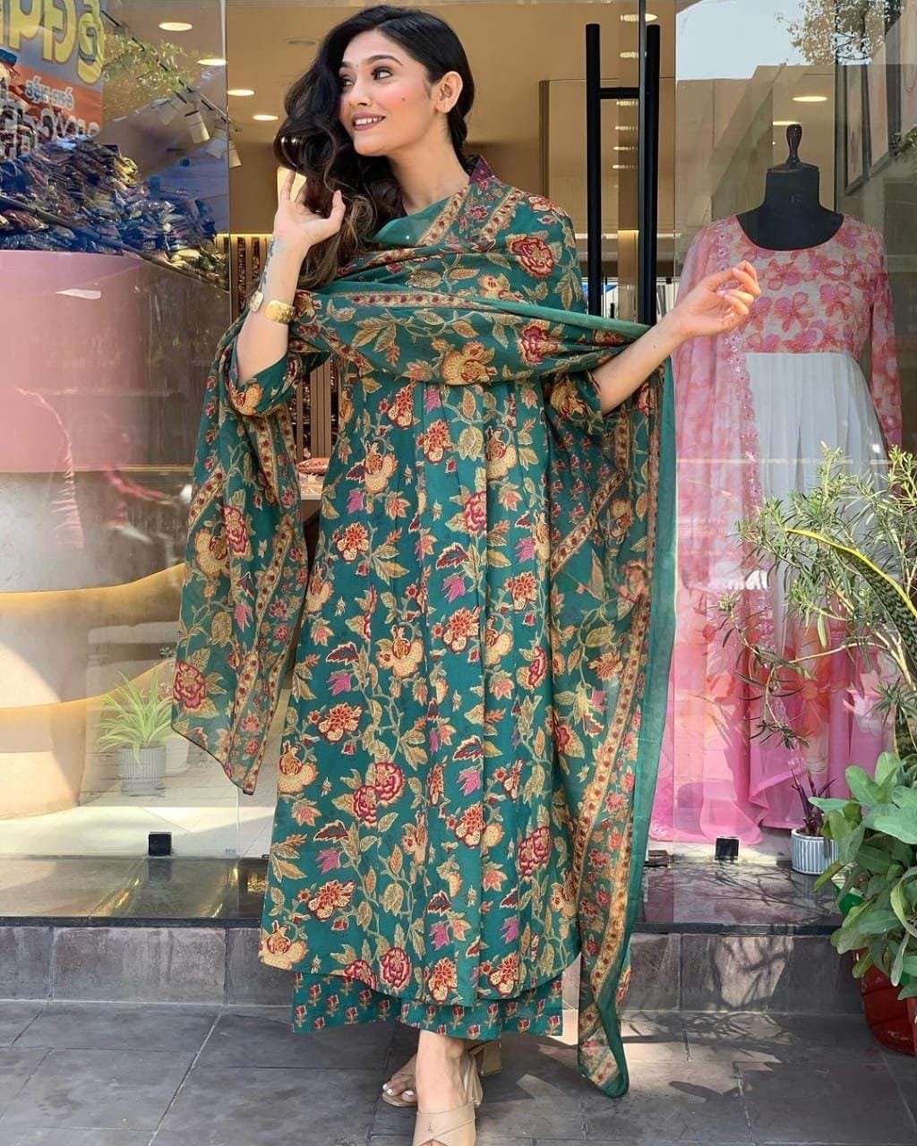 This A-line pant set is perfect for the summer season with its vibrant floral print and confident pocket one side. Plus, the included matching dupatta completes the look and adds an extra touch of style.(WARED205)