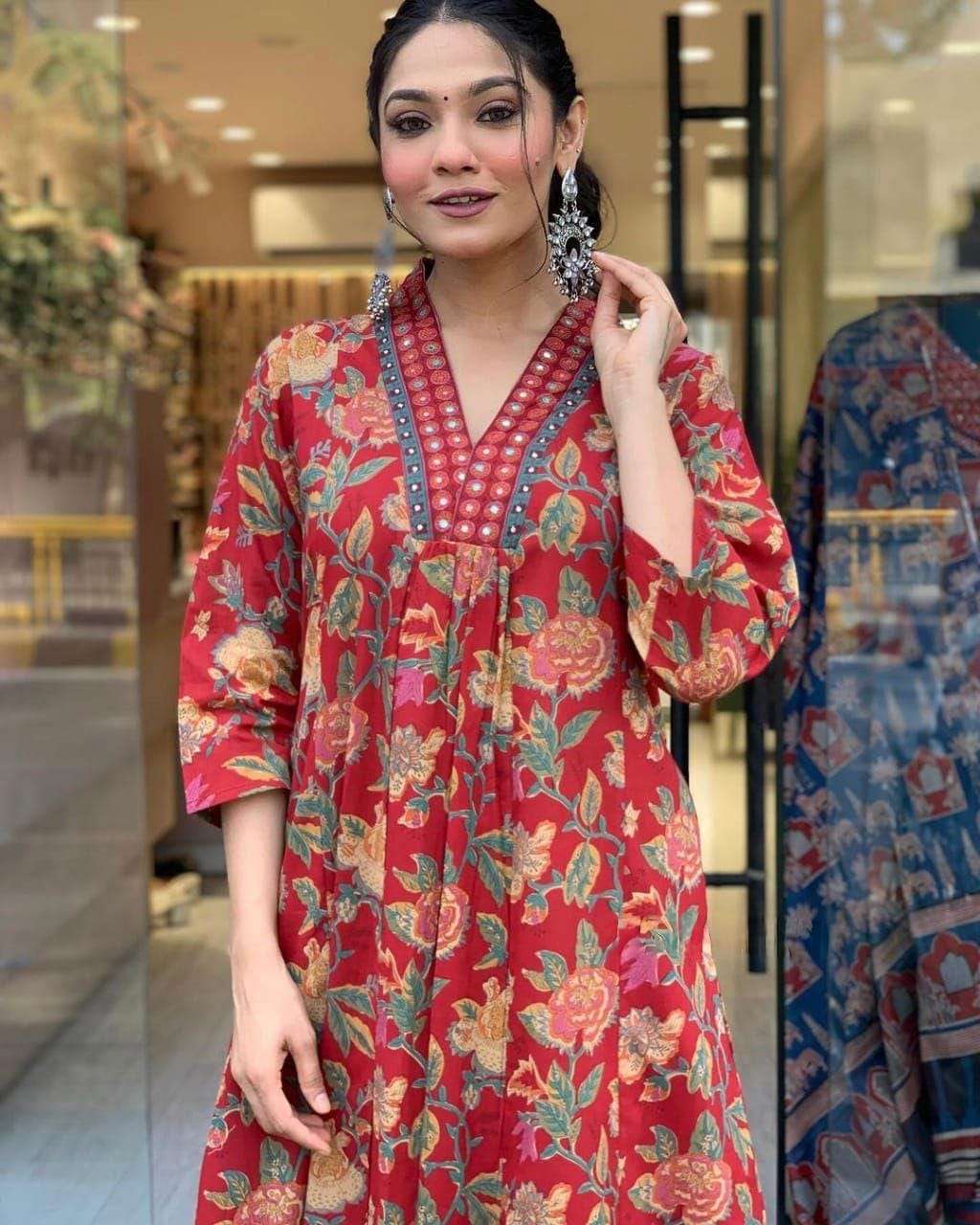 This A-line pant set is perfect for the summer season with its vibrant floral print and confident pocket one side. Plus, the included matching dupatta completes the look and adds an extra touch of style.(WARED206)