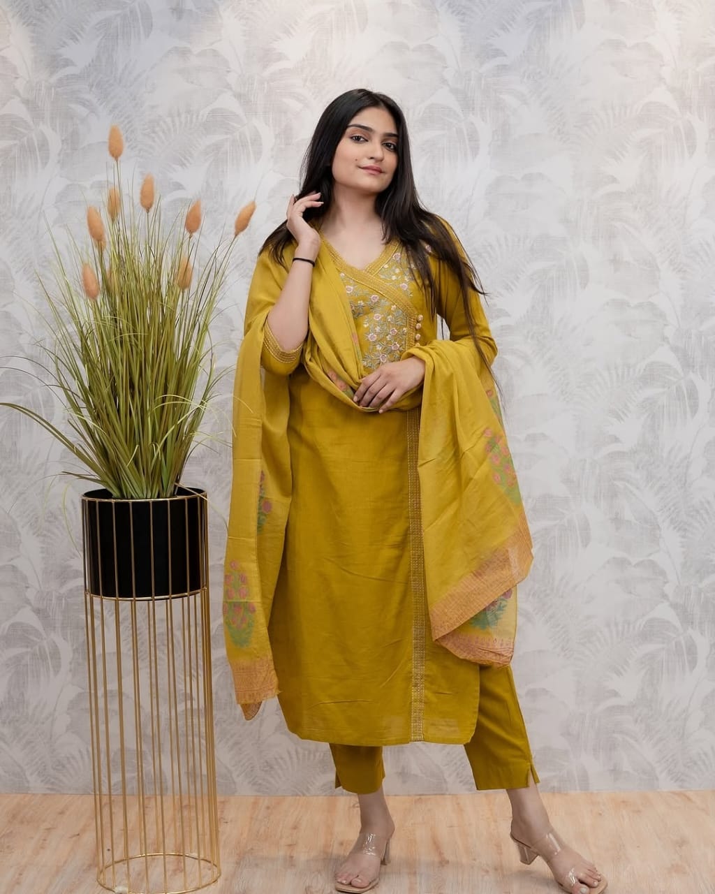 Look straight out of a dreamy movie set as ;you turn around and walk in this elegant flaired suit ! The perfect of traditional wear