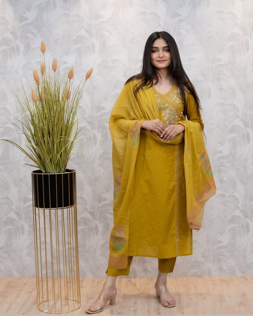 Look straight out of a dreamy movie set as ;you turn around and walk in this elegant flaired suit ! The perfect of traditional wear