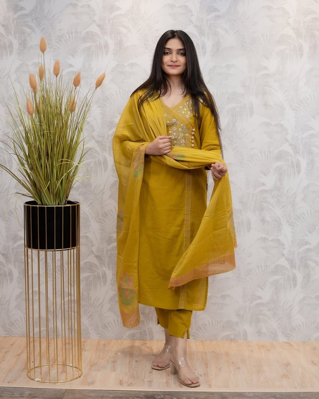 Look straight out of a dreamy movie set as ;you turn around and walk in this elegant flaired suit ! The perfect of traditional wear