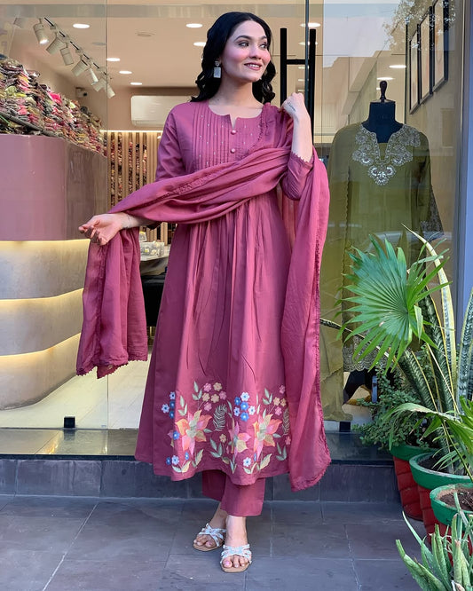We presents a stunning Cotton anarkali Suit Set-a perfect blend of traditional patterns