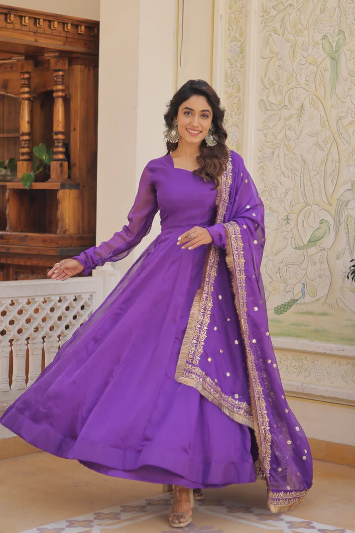 Womensavtar Russian Silk Gown-Dupatta With Attractive Embroidered Sequins work with Lace Border.