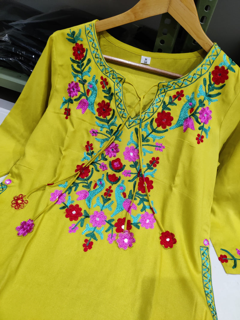 New in festive aari work kurta Plazzo set. Get your hands on our beautiful lemon green kurti with intricate thread aari