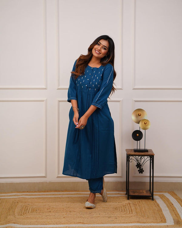 Upgrade your office wear wardrobe with this classy *teal blue kurti pant with beautiful manual tagai &amp; button work detailing for all day comfort and trendy look