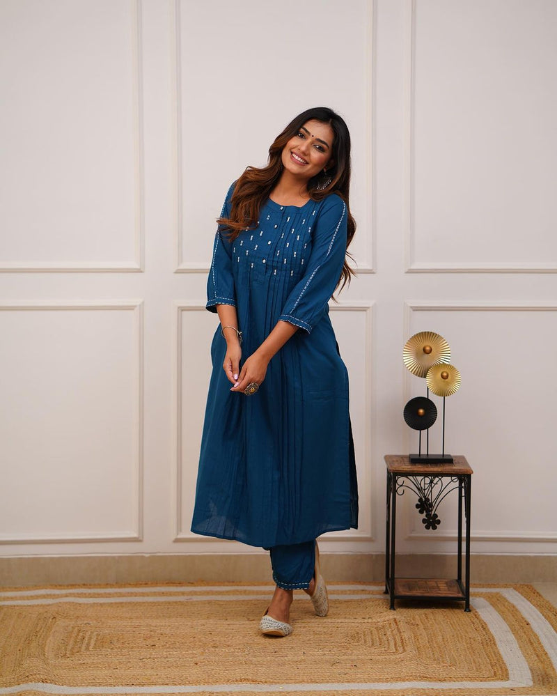 Upgrade your office wear wardrobe with this classy *teal blue kurti pant with beautiful manual tagai &amp; button work detailing for all day comfort and trendy look