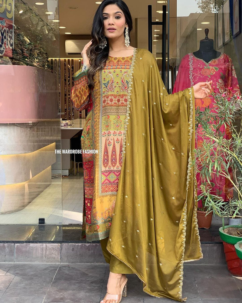 Featuring Glamorous Heavy Silk Suit Set Which is Beautifully Decorated With Intricate Handwork, Original Mirror Work And Jari Work