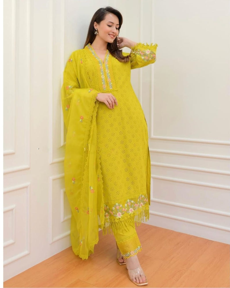 New Pakistani Schiffli Cutwork Suit set. Crafted with delicacy, the kurta has beautiful embroidery all-over. The embroidered sleeves and bottom adding an extra touch of elegance