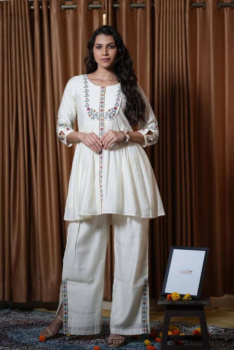 Look stylish in our new off white fully embroidered cotton slub kurta and plazo set for all day comfort this festival session