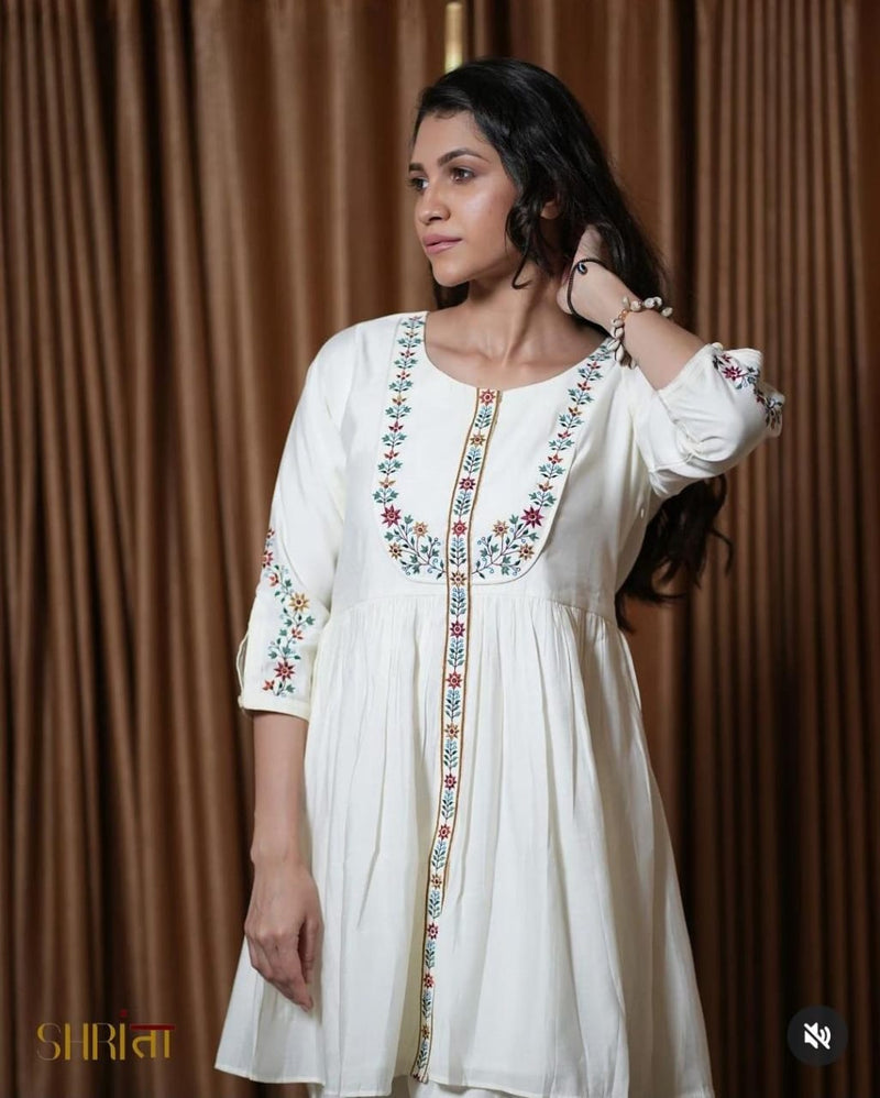 Look stylish in our new off white fully embroidered cotton slub kurta and plazo set for all day comfort this festival session