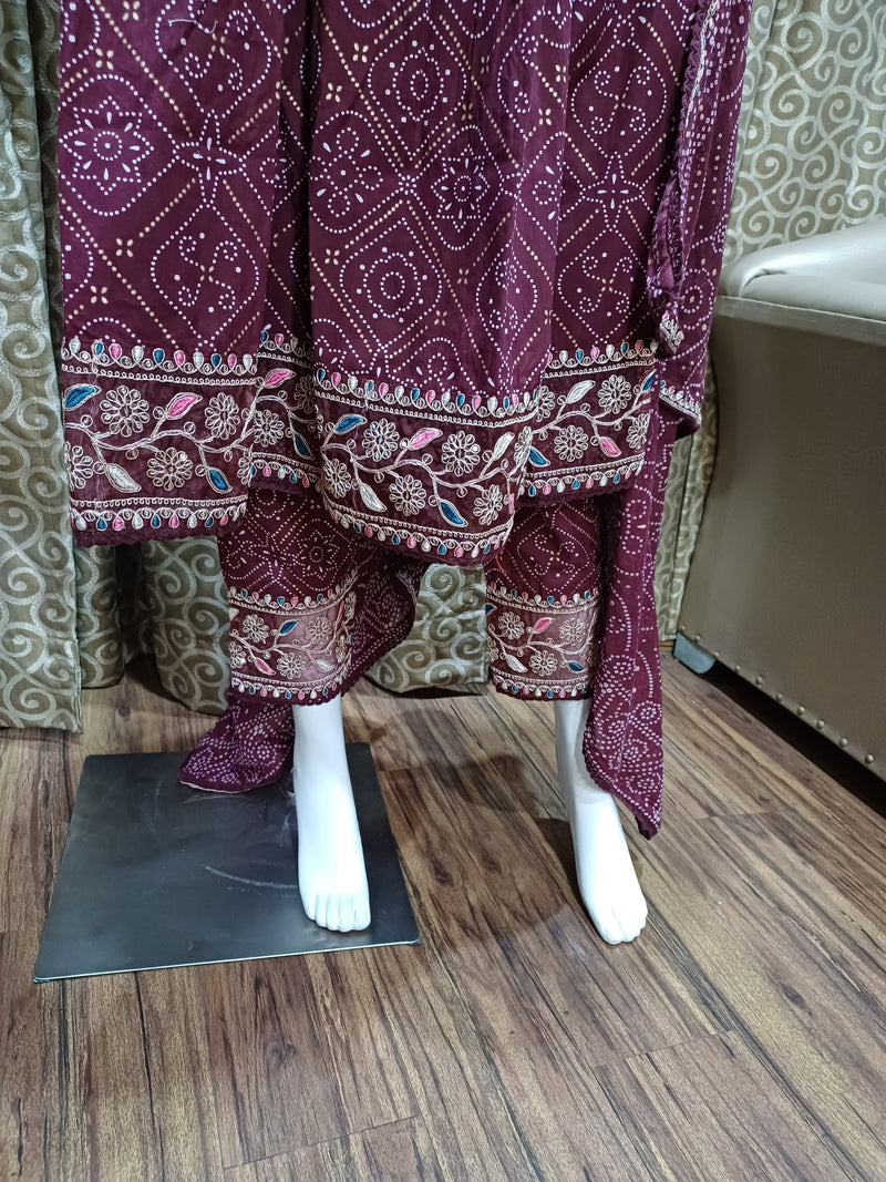 Featuring Beautiful Suit Set which is decorated with Dori Embroidery work Bandhani prints. It is made in premium Cotton Febric.