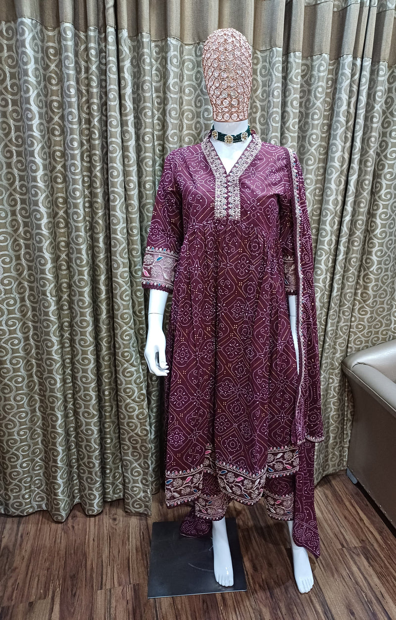 Featuring Beautiful Suit Set which is decorated with Dori Embroidery work Bandhani prints. It is made in premium Cotton Febric.