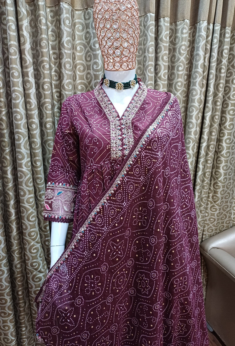 Featuring Beautiful Suit Set which is decorated with Dori Embroidery work Bandhani prints. It is made in premium Cotton Febric.