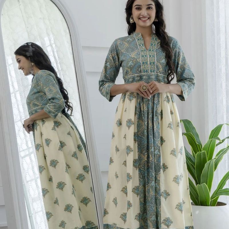 Featuring Beautiful Cotton Cambric &nbsp;Suit Cum Gown Set Which Is Beautifully Decorated With Original Khatliwork with Beautiful Moti and Lace Detailing in Neck.