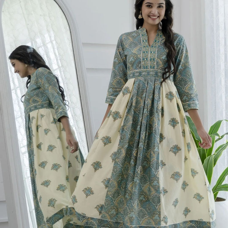 Featuring Beautiful Cotton Cambric &nbsp;Suit Cum Gown Set Which Is Beautifully Decorated With Original Khatliwork with Beautiful Moti and Lace Detailing in Neck.