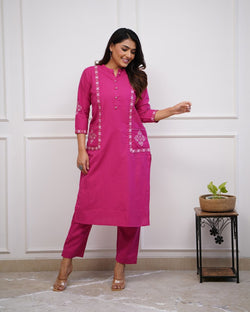 Upgrade your office wear wardrobe with this classy kurti pant with embroidery  button work detailing for all day comfort and trendy look