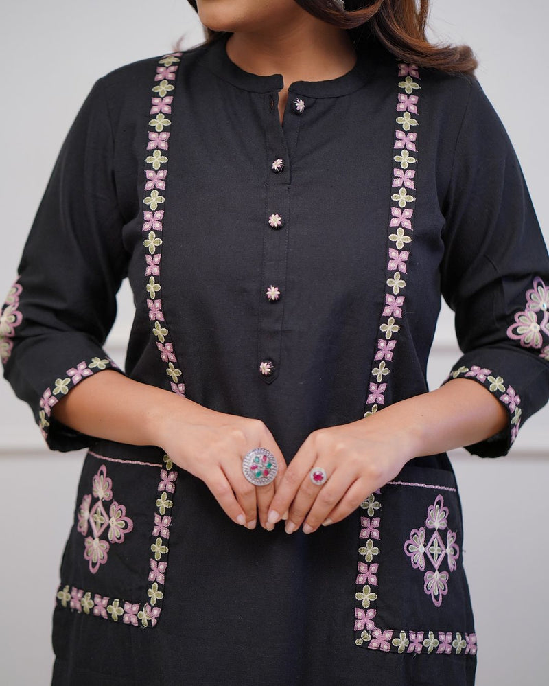 Upgrade your office wear wardrobe with this classy kurti pant with embroidery button work detailing for all day comfort and trendy look