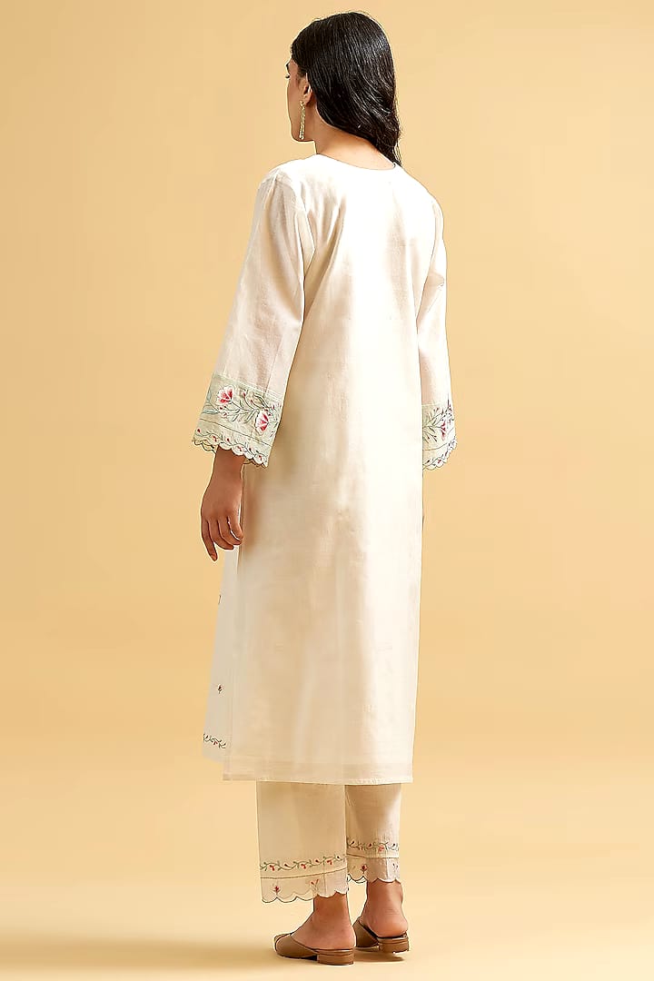 A traditional yet Stylish Kurta with colour full threadwork hand embroidery.