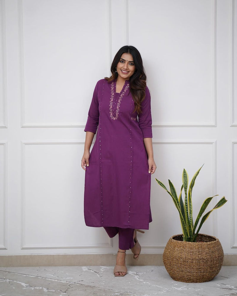 Pure cotton pleated pattern kurta with heavy embroided panels and sequence work..