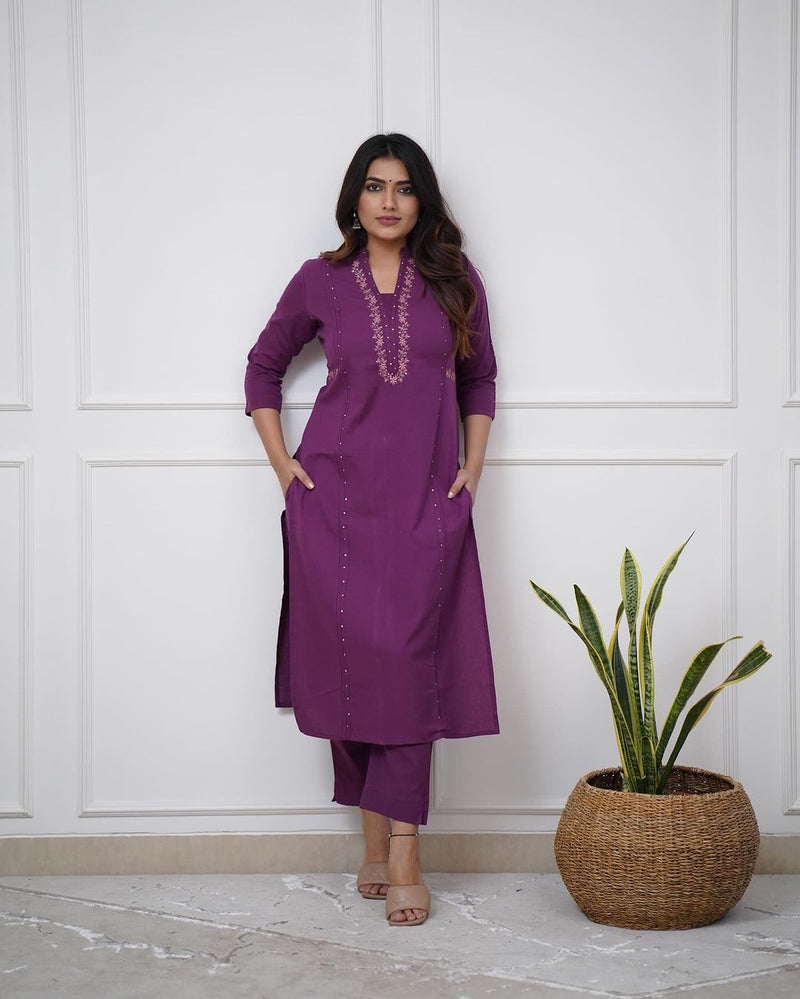 Pure cotton pleated pattern kurta with heavy embroided panels and sequence work..