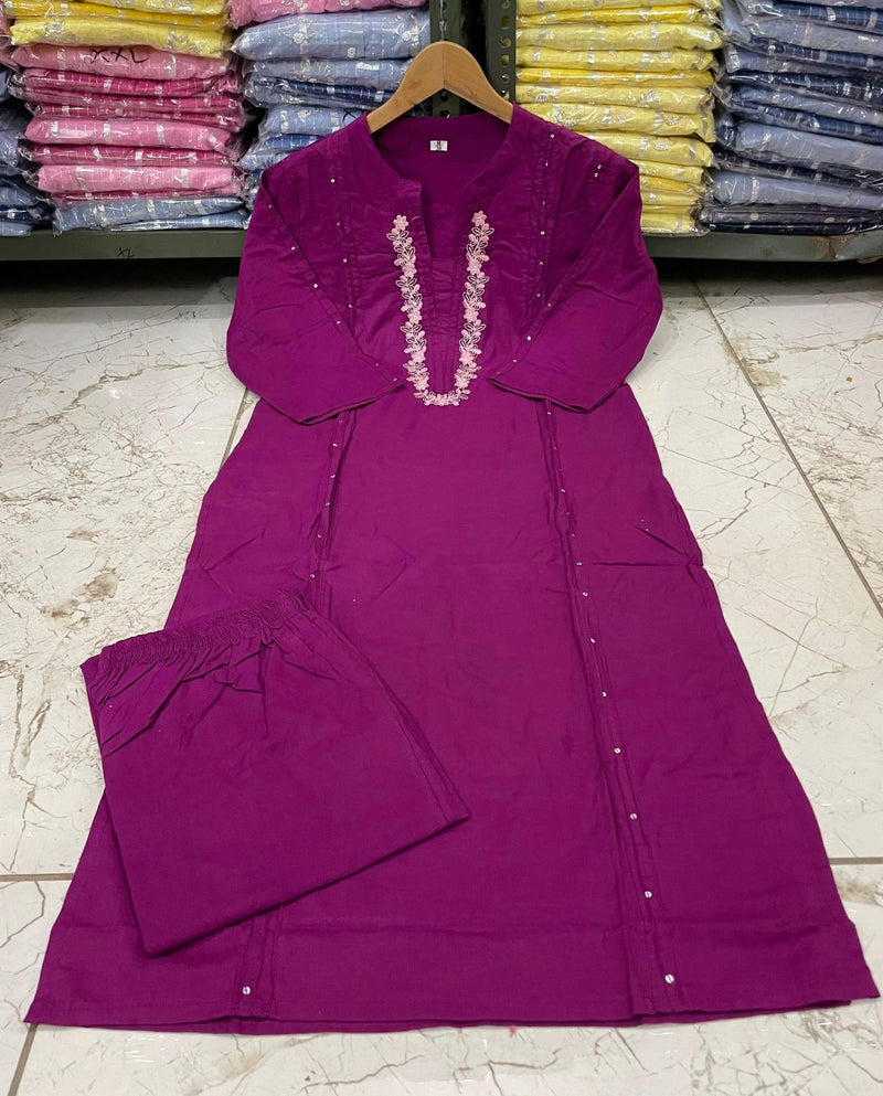 Pure cotton pleated pattern kurta with heavy embroided panels and sequence work..