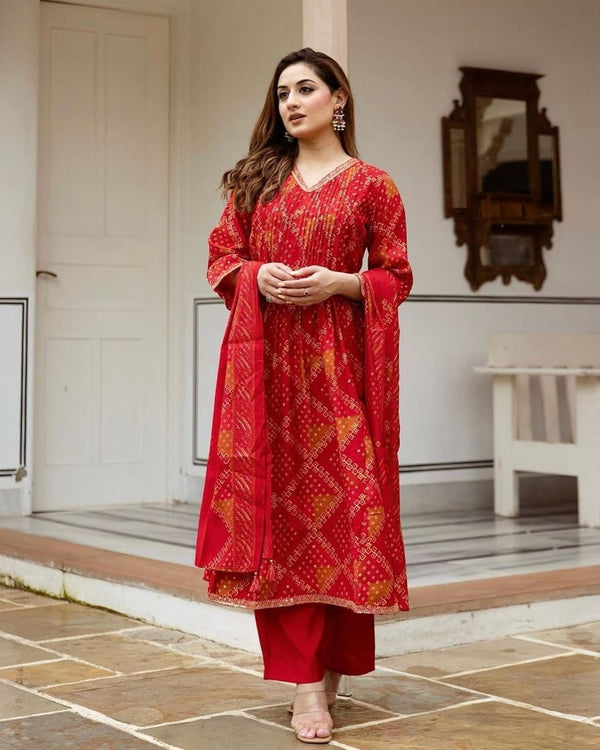 A perfect outfit to mark the special moments. It is paired with comfortable wide leg pants and bandhani print ed dupatta.