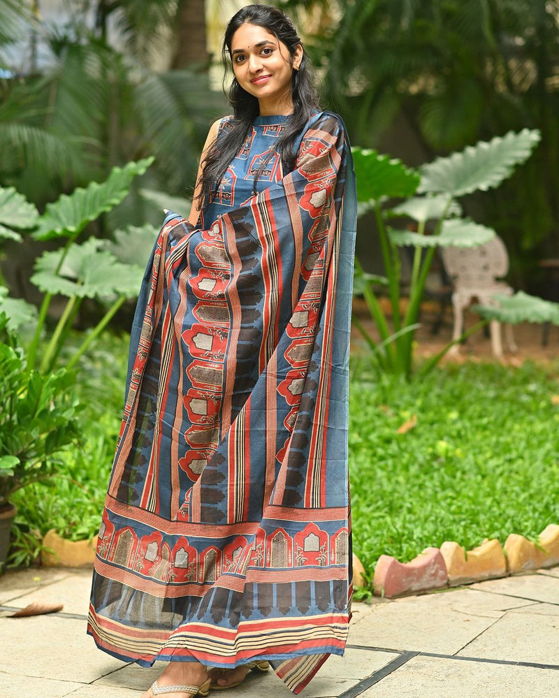 Ajrakh printed A-line Kurti comes with Halter detailing (attached elbow length sleeves) with pockets on the kurta