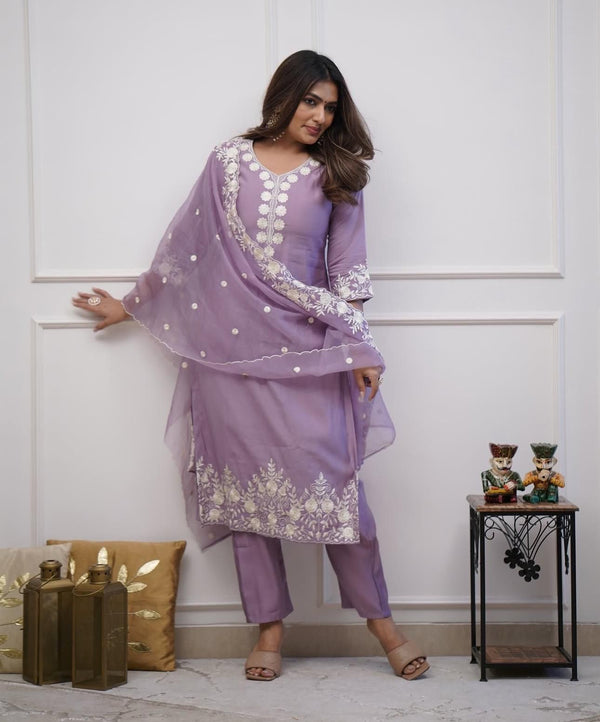 Featuring beautiful Roman silk Suit set which is beautifully decorated It is paired with matching colour pants(NFRD283)