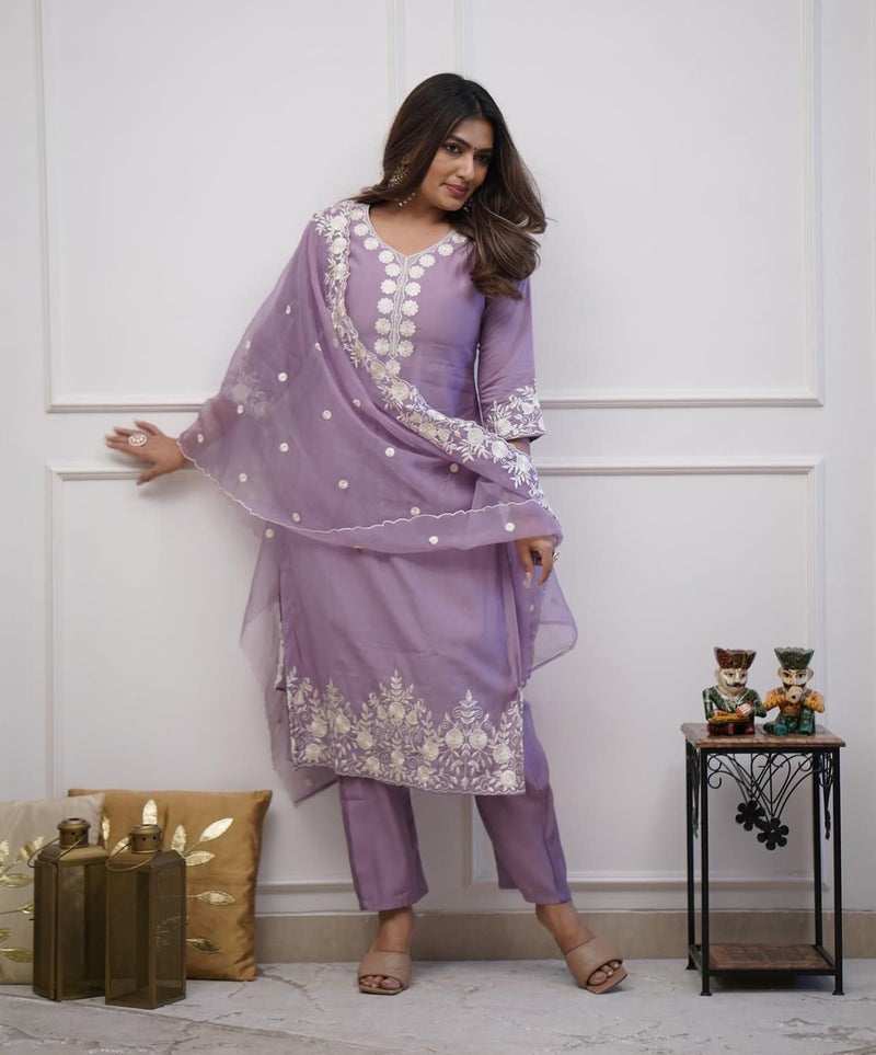 Featuring beautiful Roman silk Suit set which is beautifully decorated It is paired with matching colour pants(NFRD283)