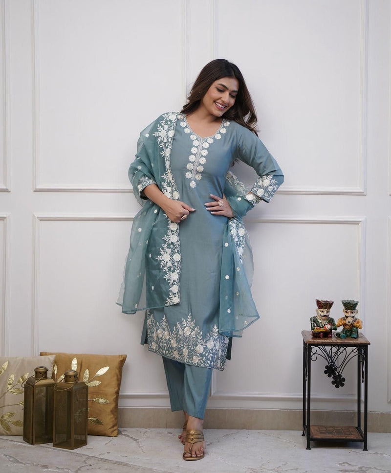 Featuring beautiful Roman silk Suit set which is beautifully decorated It is paired with matching colour pants(NFRD284)