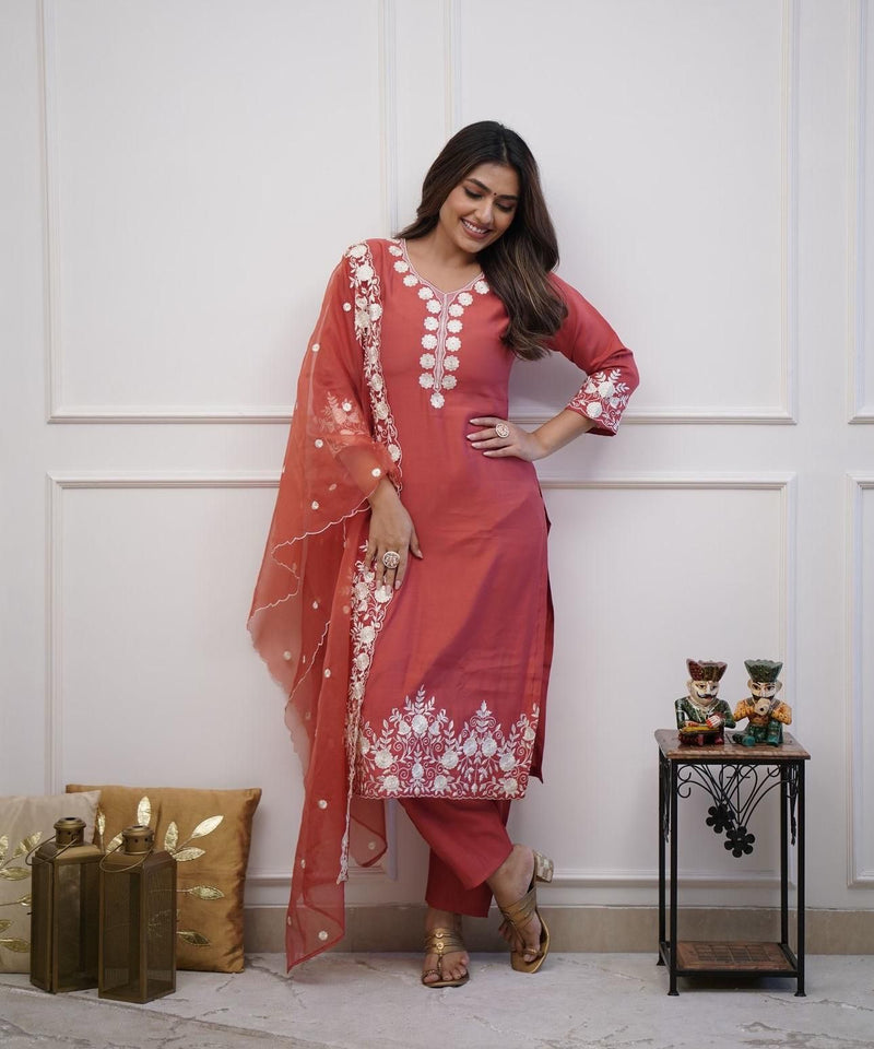 Featuring beautiful Roman silk Suit set which is beautifully decorated It is paired with matching colour pants(NFRD282)