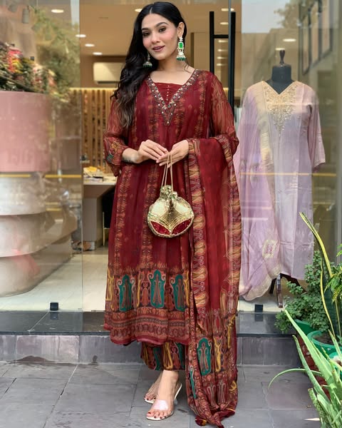 Beautiful pure premium chiffon digital printed Anarkali set with handwork on neck it has attached lining paired up with santoon slik pant and Organza digital printed dupatta sets