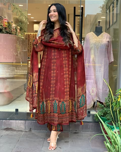 Beautiful pure premium chiffon digital printed Anarkali set with handwork on neck it has attached lining paired up with santoon slik pant and Organza digital printed dupatta sets