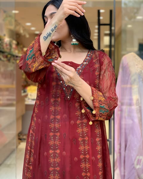 Beautiful pure premium chiffon digital printed Anarkali set with handwork on neck it has attached lining paired up with santoon slik pant and Organza digital printed dupatta sets