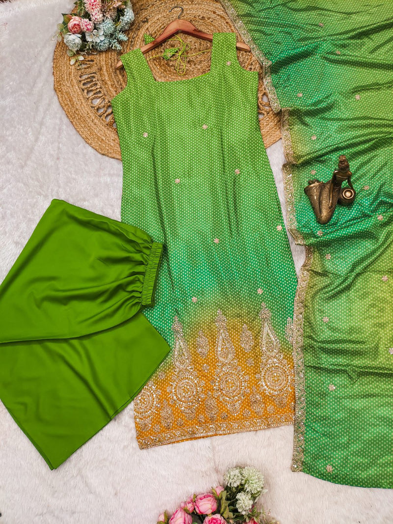 Launching a stunning green 🌹bandhej print straight suit with intricate beadwork, 😍paired with a pure crepe palazzo and a gorgeous beadwork dupatta