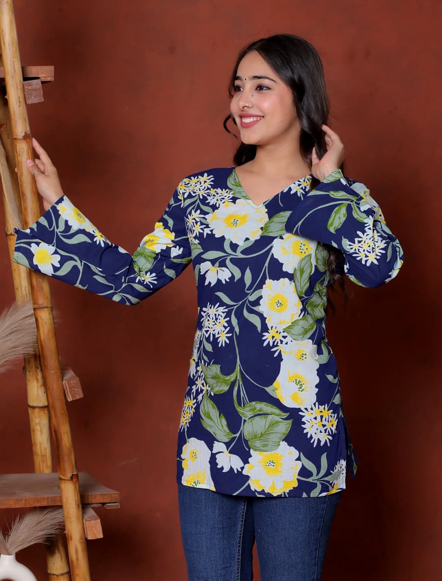 Elevate your ethnic wardrobe with this chic and vibrant fuchsia pink blue skay green  kurti. Featuring a striking white lily print, this piece is designed for the modern woman who loves a mix of classic charm and edgy details.(RRRD40