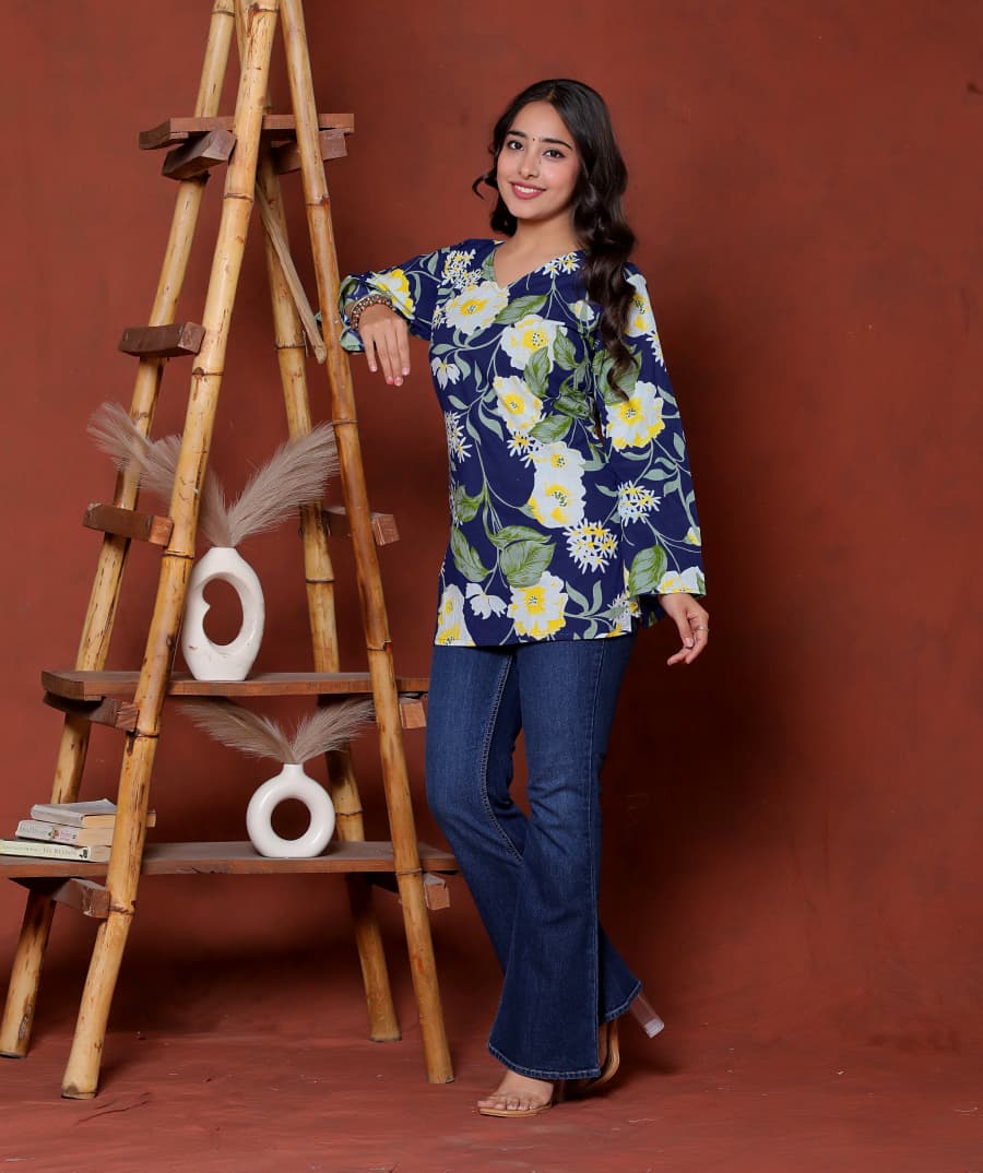 Elevate your ethnic wardrobe with this chic and vibrant fuchsia pink blue skay green  kurti. Featuring a striking white lily print, this piece is designed for the modern woman who loves a mix of classic charm and edgy details.(RRRD40
