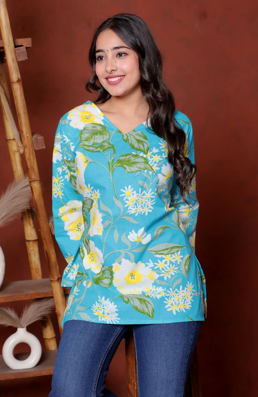 Elevate your ethnic wardrobe with this chic and vibrant fuchsia pink blue skay green  kurti. Featuring a striking white lily print, this piece is designed for the modern woman who loves a mix of classic charm and edgy details.(RRRD40