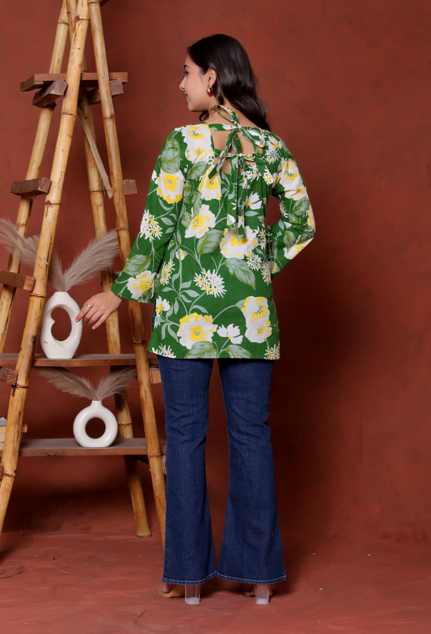 Elevate your ethnic wardrobe with this chic and vibrant fuchsia pink blue skay green  kurti. Featuring a striking white lily print, this piece is designed for the modern woman who loves a mix of classic charm and edgy details.(RRRD40