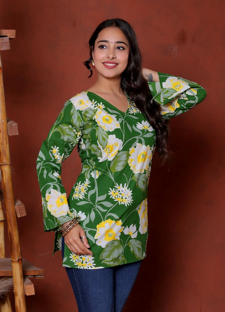 Elevate your ethnic wardrobe with this chic and vibrant fuchsia pink blue skay green  kurti. Featuring a striking white lily print, this piece is designed for the modern woman who loves a mix of classic charm and edgy details.(RRRD40