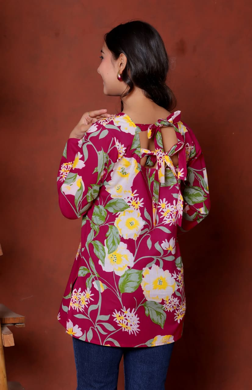 Elevate your ethnic wardrobe with this chic and vibrant fuchsia pink blue skay green  kurti. Featuring a striking white lily print, this piece is designed for the modern woman who loves a mix of classic charm and edgy details.(RRRD40
