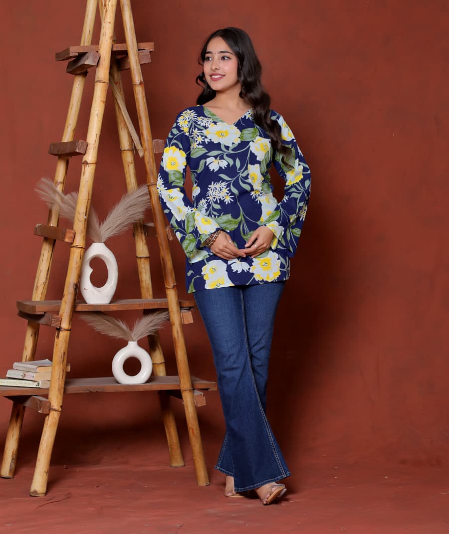 Elevate your ethnic wardrobe with this chic and vibrant fuchsia pink blue skay green  kurti. Featuring a striking white lily print, this piece is designed for the modern woman who loves a mix of classic charm and edgy details.(RRRD40