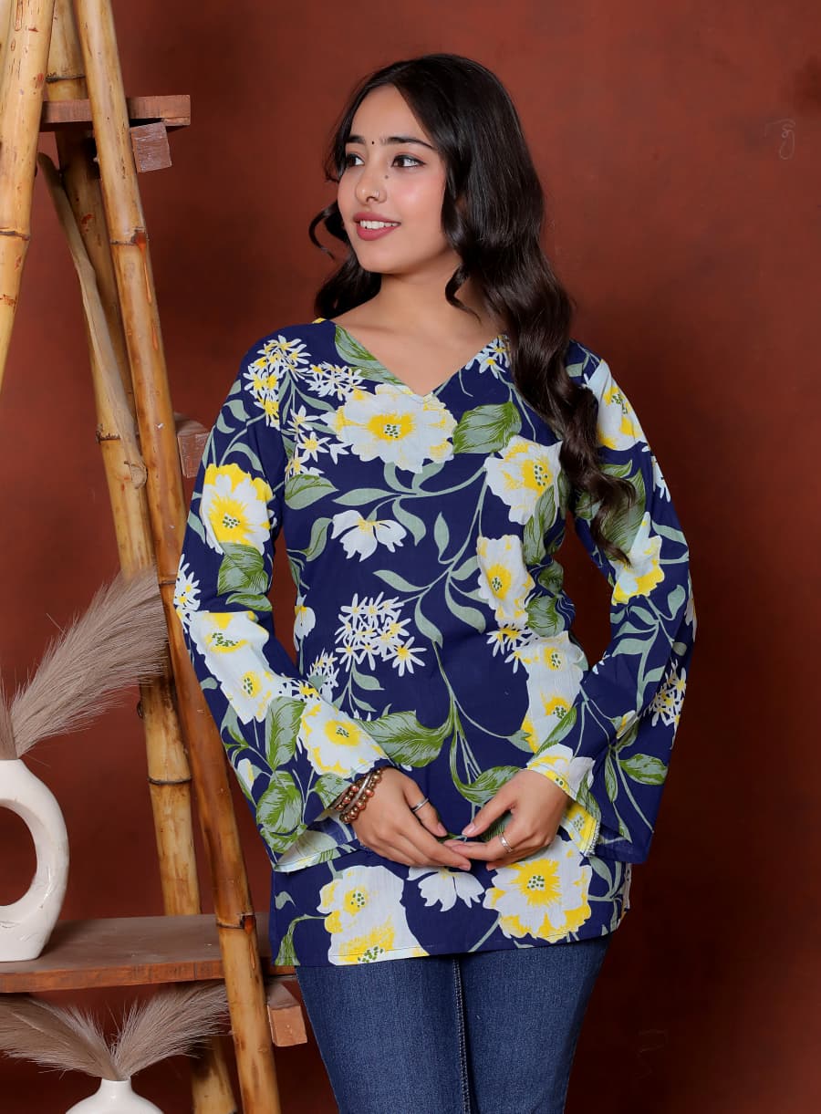 Elevate your ethnic wardrobe with this chic and vibrant fuchsia pink blue skay green  kurti. Featuring a striking white lily print, this piece is designed for the modern woman who loves a mix of classic charm and edgy details.(RRRD40